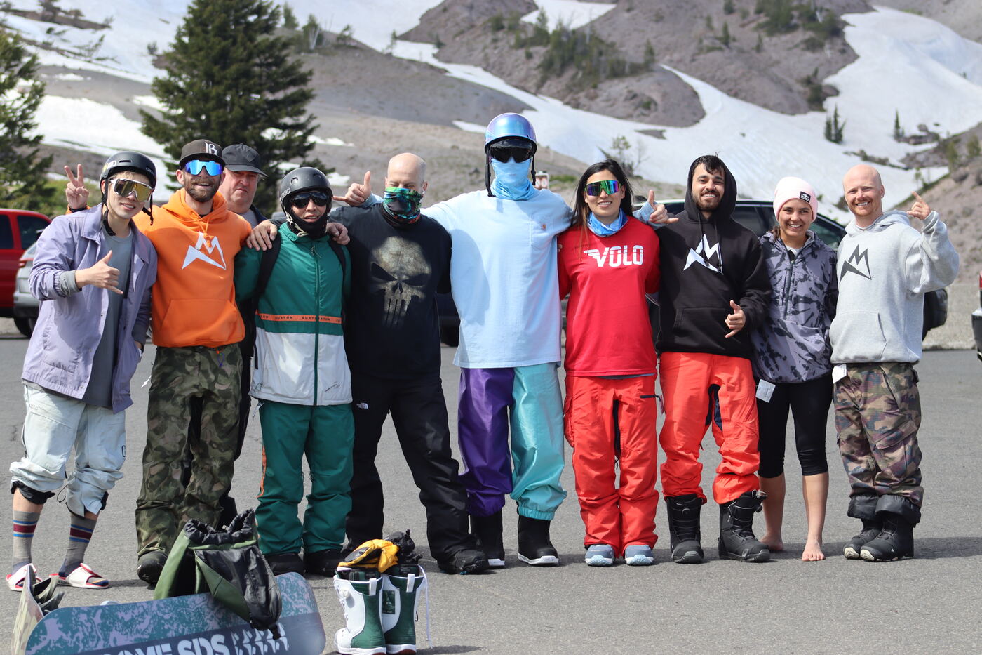 A group of riders at the top of a run